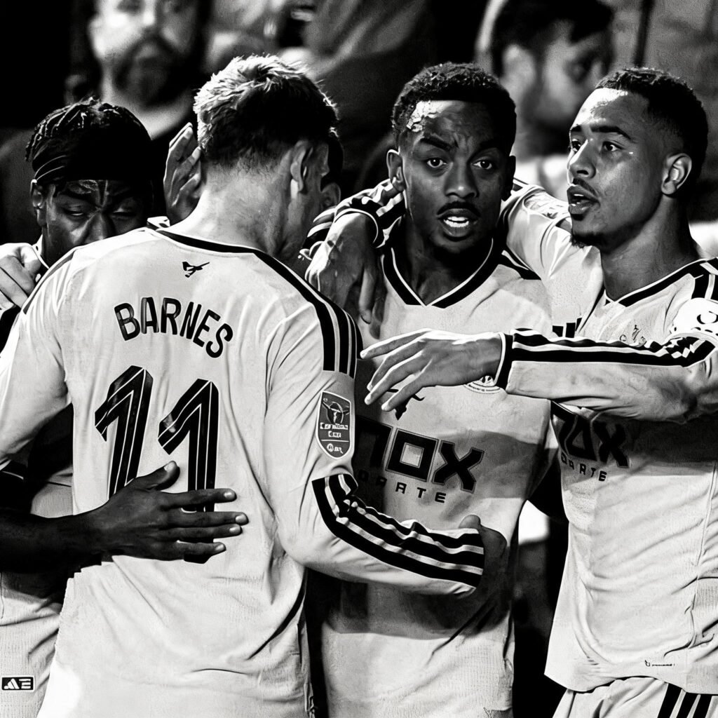 Celebrating Willock's goal